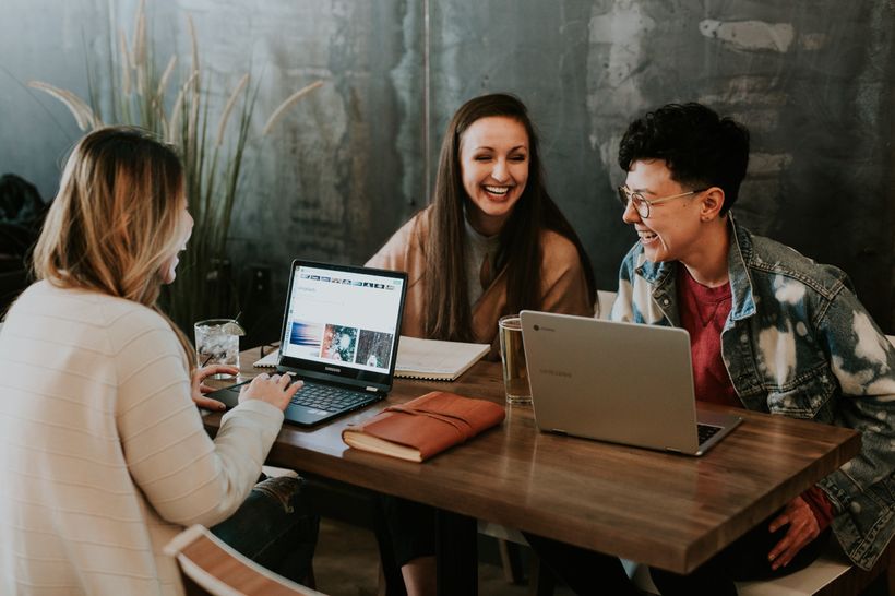Marketers going through a website checklist